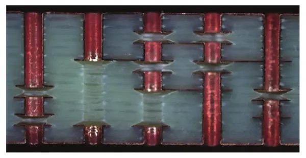 Figure 7 Through Hole Interconnect Cross Section at Any Layer